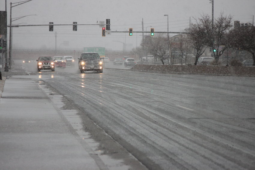 Snow was starting to stick at Hampden Avenue and Galapago Street in Englewood at 10 a.m.